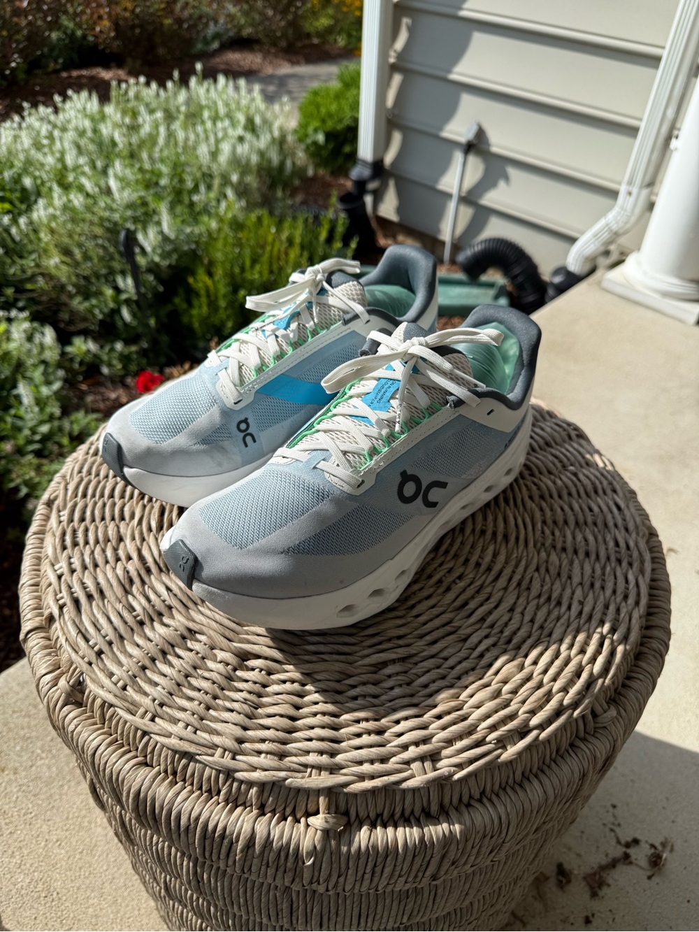 On Running Women's Cloud With White and Light Blue Accents